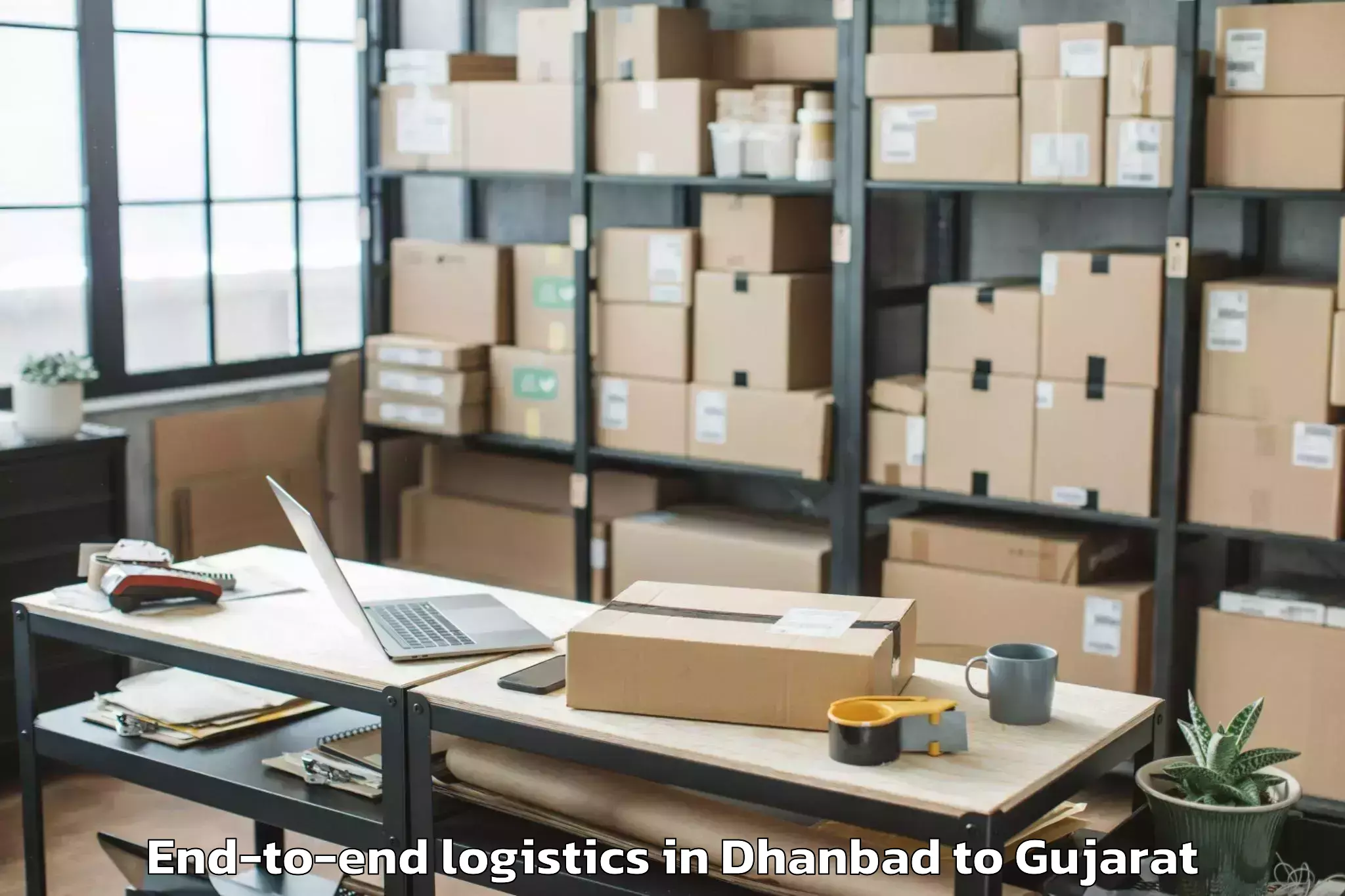 Trusted Dhanbad to Dhasa End To End Logistics